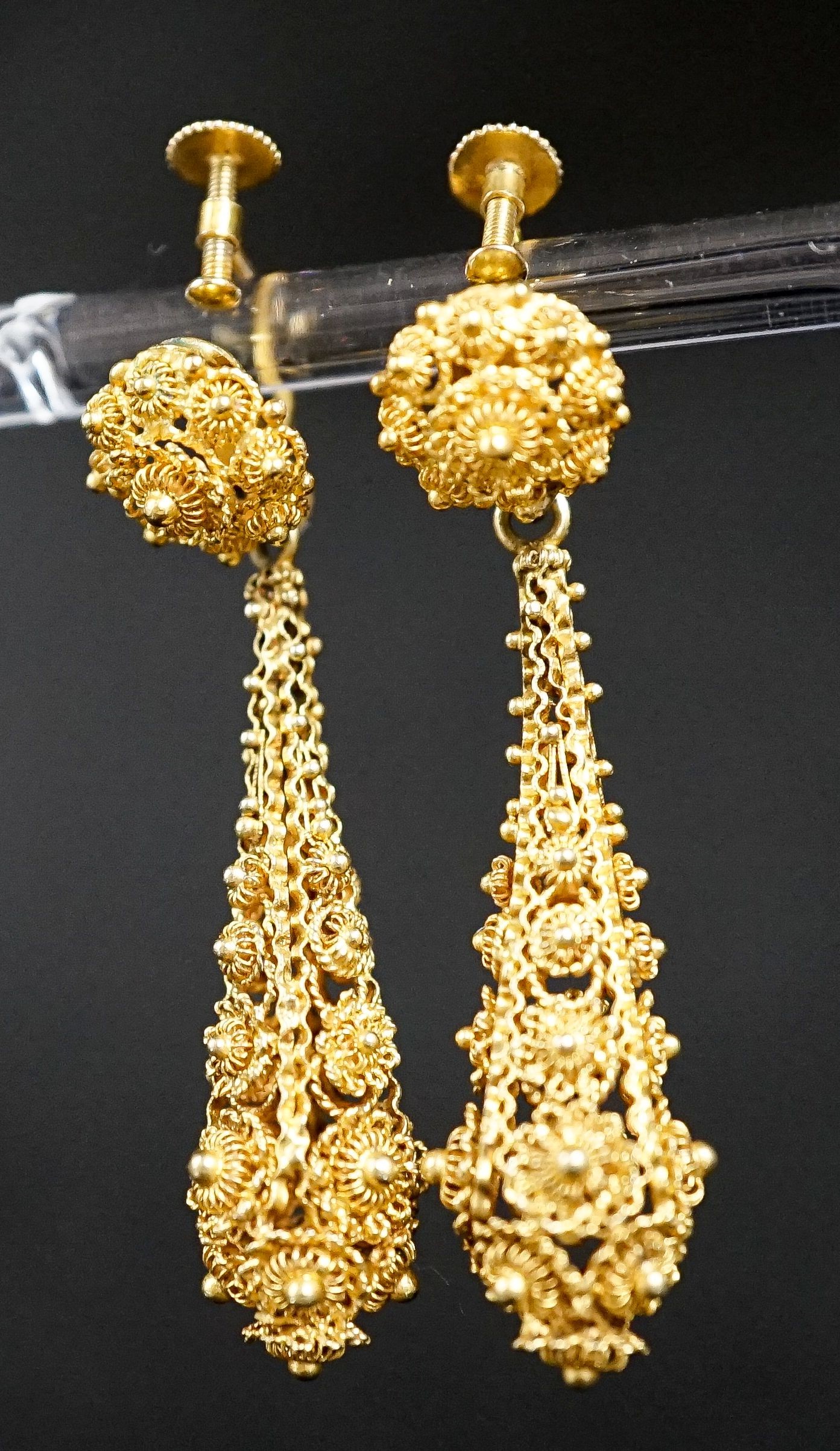 A pair of antique yellow metal filigree cannetile work teardrop shaped earrings, 45mm. 4.6cm.